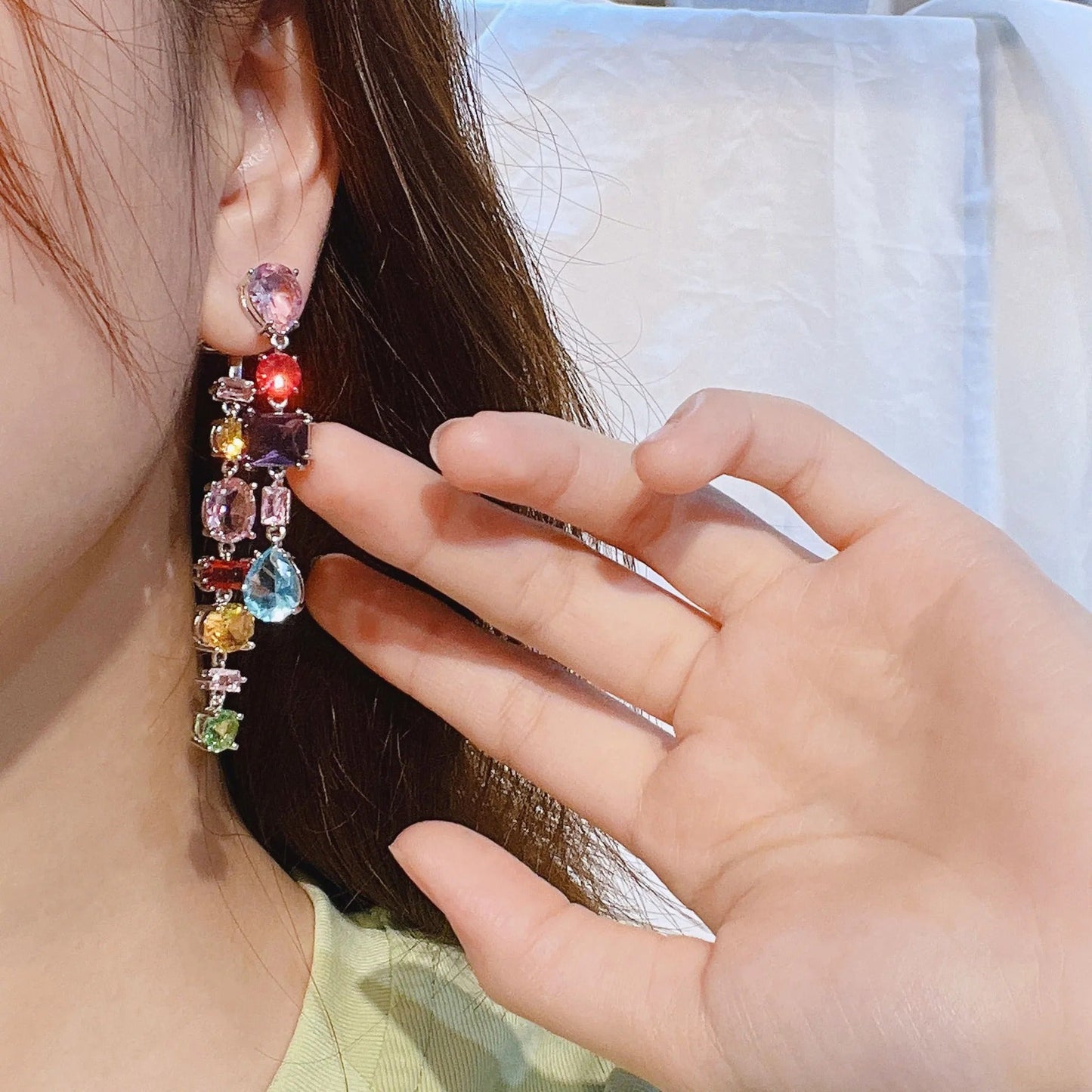 Colorful gemstone drop earrings with multi-stone design, perfect for fashion accessories and stylish outfits.