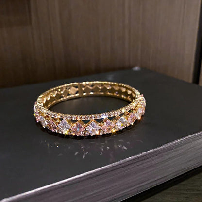 Gold bangle with pink and clear crystals, elegant fashion jewelry for women